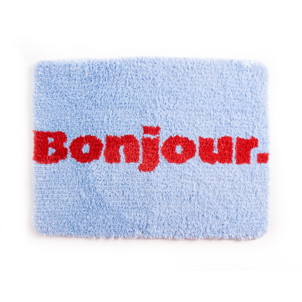 Hellblaue "Bonjour" Badematte